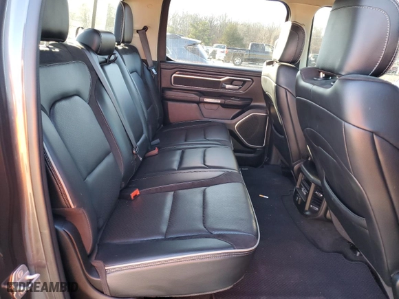2021 Ram 1500 Laramie with VIN 1C6SRFJTXMN665384, listed as a Copart auction lot 42037685 with 76,836 mi miles and Salvage Title. Bid and sale history available at carsss.com. Image 10.