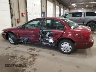 2002 Saturn SL with VIN 1G8ZH52822Z228302, listed as a Copart auction lot 58043985 with 153,058 mi miles and Salvage title. Bid and sale history available at DreamBid. Image 2.