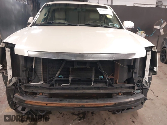 2007 Cadillac Escalade z VIN 1GYFK63837R238451, wystawiony jako IAAI lot #42368857 z przebiegiem 182 030 mil mil oraz . Historia ofert i sprzedaży dostępna na DreamBid. Obrazek 6.