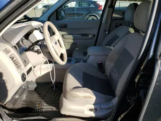 2008 Ford Escape XLT with VIN 1FMCU93168KD23345, listed as a Copart auction lot 77482674 with 142,607 mi miles and Clean title. Bid and sale history available at DreamBid. Image 7.