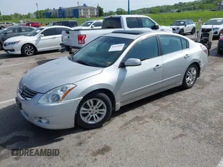 2012 Nissan Altima S with VIN 1N4AL2AP6CN410902, listed as a IAAI auction lot 42147896 with 232,833 mi miles and . Bid and sale history available at carsss.com. Image 2.