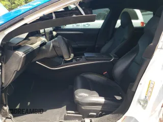 2021 Tesla Model S Plaid with VIN 5YJSA1E64MF438794, listed as a Copart auction lot 56903365 with 63,671 mi miles and Salvage title. Bid and sale history available at DreamBid. Image 7.