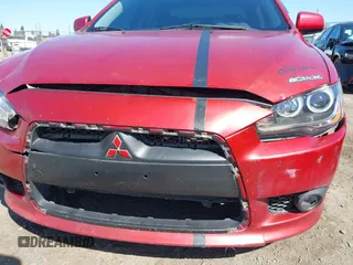 2012 Mitsubishi Lancer GT with VIN JA32U8FW8CU014358, listed as a IAAI auction lot 42502795 with 277,869 mi miles and . Bid and sale history available at DreamBid. Image 14.
