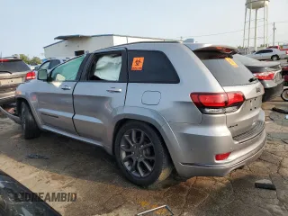 2020 Jeep Grand Cherokee Overland with VIN 1C4RJFCG3LC251579, listed as a Copart auction lot 70312594 with 59,656 mi miles and Salvage Title. Bid and sale history available at carsss.com. Image 2.