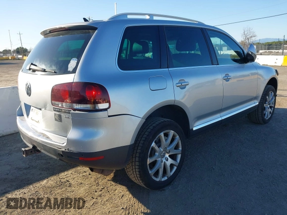 2010 Volkswagen Touareg VR6 with VIN WVGBF7A92AD001704, listed as a IAAI auction lot 41751316 with 80,597 mi miles and . Bid and sale history available at DreamBid. Image 4.