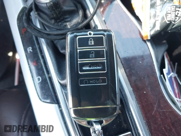 2017 Acura TLX with VIN 19UUB1F32HA007901, listed as a IAAI auction lot 41877950 with 110,598 mi miles and . Bid and sale history available at DreamBid. Image 11.