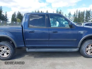 2003 Ford F-150 XLT with VIN 1FTRW08L93KD64270, listed as a IAAI auction lot 42088905 with 181,528 mi miles. Bid and sale history available at carsss.com. Image 13.
