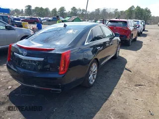 2014 Cadillac XTS Luxury with VIN 2G61M5S3XE9202454, listed as a IAAI auction lot 42025883 with 93,977 mi miles and . Bid and sale history available at DreamBid. Image 4.