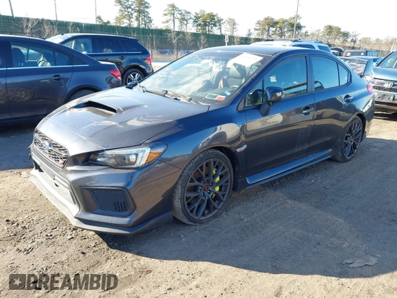2018 Subaru WRX STI с VIN JF1VA2M61J9813122, выставлен на аукционе IAAI как лот 41576235 с пробегом 49 527 миль миль и . История ставок и продаж доступна на DreamBid. Изображение 2.