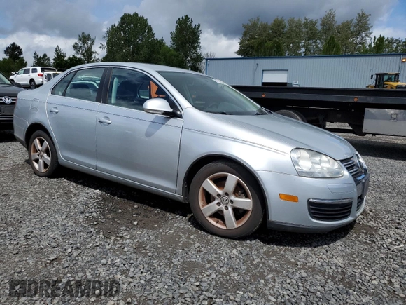 2009 Volkswagen Jetta SE with VIN 3VWRM71K99M156016, listed as a Copart auction lot 57711095 with 206,869 mi miles and Clean title. Bid and sale history available at DreamBid. Image 4.