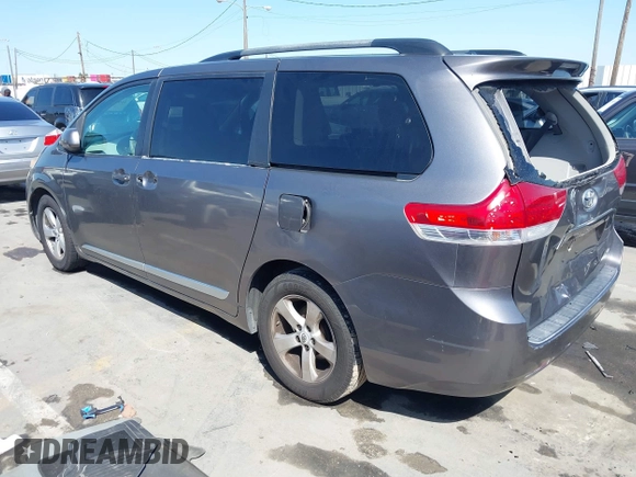 2012 Toyota Sienna LE AAS with VIN 5TDKK3DC9CS184722, listed as a IAAI auction lot 41942991 with 227,783 mi miles. Bid and sale history available at carsss.com. Image 3.