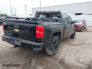 2018 Chevrolet Silverado 1500 Custom with VIN 3GCUKPEC0JG155068, listed as a IAAI auction lot 41277139 with 104,351 mi miles. Bid and sale history available at carsss.com. Image 4.