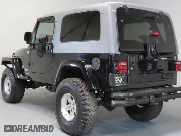 2005 Jeep Wrangler Unlimited with VIN 1J4FA44S75P305935, listed as a Copart auction lot 65582205 with 116,569 mi miles and Salvage title. Bid and sale history available at DreamBid. Image 4.
