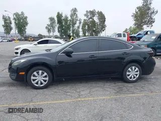 2012 Mazda 6 i Sport with VIN 1YVHZ8BH6C5M03802, listed as a IAAI auction lot 42041022 with 202,047 mi miles and . Bid and sale history available at carsss.com. Image 14.