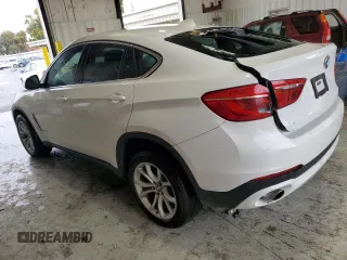 2015 BMW X6 sDrive35i with VIN 5UXKU0C50F0F91865, listed as a Copart auction lot 82128374 with 122,395 mi miles and Salvage Title. Bid and sale history available at carsss.com. Image 2.