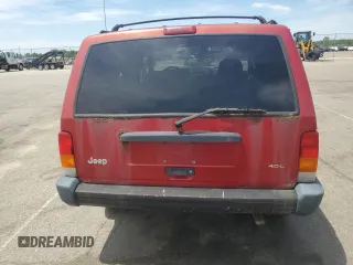 1998 Jeep Cherokee Sport with VIN 1J4FJ68S2WL285432, listed as a Copart auction lot 57183145 with 284,162 mi miles and Clean title. Bid and sale history available at DreamBid. Image 6.