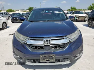 2018 Honda CR-V Touring with VIN 7FARW1H91JE026094, listed as a Copart auction lot 59942445 with 150,329 mi miles and Salvage title. Bid and sale history available at DreamBid. Image 5.