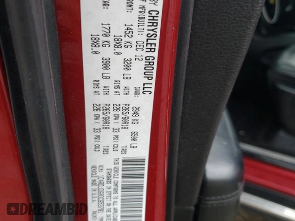 2013 Dodge Durango Crew z VIN 1C4RDJDG0DC653781, wystawiony jako Copart lot #51999065 z przebiegiem 209 640 mil mil oraz Czysty tytuł • Clean title. Historia ofert i sprzedaży dostępna na DreamBid. Obrazek 14.