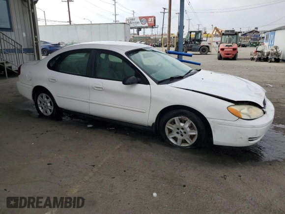 2006 Ford Taurus SE with VIN 1FAHP53U86A237001, listed as a Copart auction lot 62858785 with 133,697 mi miles and Salvage title. Bid and sale history available at DreamBid. Image 4.