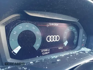 2022 Audi Q3 S line Premium z VIN WA1DECF30N1005992, wystawiony jako IAAI lot #41101352 z przebiegiem 37 399 mil mil oraz . Historia ofert i sprzedaży dostępna na DreamBid. Obrazek 7.