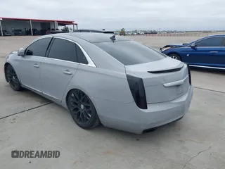 2013 Cadillac XTS Luxury with VIN 2G61P5S38D9213426, listed as a IAAI auction lot 41098261 with Not Provided miles. Bid and sale history available at carsss.com. Image 3.