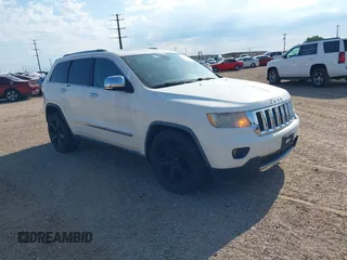 2011 Jeep Grand Cherokee Overland Summit with VIN 1J4RR6GTXBC686849, listed as a IAAI auction lot 42610171 with 148,652 mi miles and . Bid and sale history available at DreamBid. Image 1.