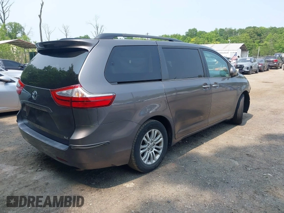 2015 Toyota Sienna XLE with VIN 5TDYK3DC6FS553695, listed as a IAAI auction lot 42418507 with 137,677 mi miles and . Bid and sale history available at DreamBid. Image 4.