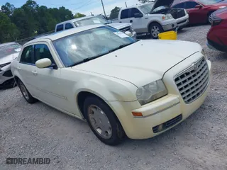 2006 Chrysler 300 Touring with VIN 2C3KA53G96H350490, listed as a IAAI auction lot 41319162 with 209,159 mi miles. Bid and sale history available at carsss.com. Image 1.