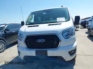 2023 Ford Transit Passenger XL with VIN 1FBAX2YG2PKA59910, listed as a IAAI auction lot 41663186 with 60,803 mi miles and . Bid and sale history available at DreamBid. Image 12.