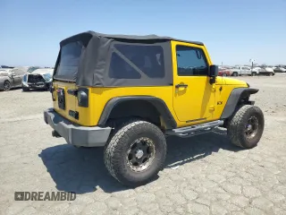 2008 Jeep Wrangler X with VIN 1J4FA24188L567678, listed as a Copart auction lot 60918635 with 185,368 mi miles and Salvage title. Bid and sale history available at DreamBid. Image 3.