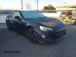 2014 Scion FR-S with VIN JF1ZNAA11E8706432, listed as a IAAI auction lot 41450785 with 153,650 mi miles and . Bid and sale history available at DreamBid. Image 1.