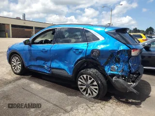 2021 Ford Escape Titanium с VIN 1FMCU9J90MUA58591, выставлен на аукционе Copart как лот 57126875 с пробегом 109 483 миль миль и Списание • Salvage title. История ставок и продаж доступна на DreamBid. Изображение 2.