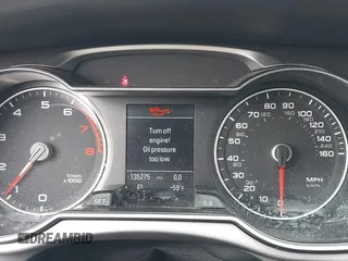 2015 Audi A4 Premium Plus z VIN WAUFFAFL5FN018440, wystawiony jako IAAI lot #42230870 z przebiegiem 135 275 mil mil oraz . Historia ofert i sprzedaży dostępna na DreamBid. Obrazek 7.