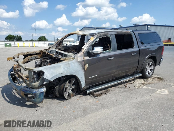 2020 Ram 1500 Laramie with VIN 1C6SRFJM9LN344248, listed as a Copart auction lot 63751575 with Not provided miles and Salvage title. Bid and sale history available at DreamBid. Image 1.