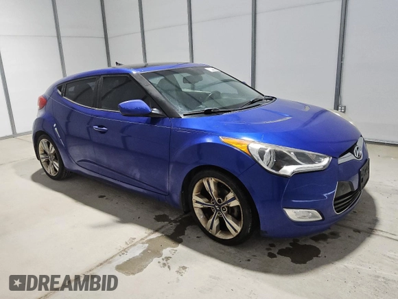 2013 Hyundai Veloster w/Black Int z VIN KMHTC6AD2DU125066, wystawiony jako Copart lot #60921325 z przebiegiem 189 503 mil mil oraz Czysty tytuł • Clean title. Historia ofert i sprzedaży dostępna na DreamBid. Obrazek 4.