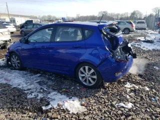2012 Hyundai Accent SE with VIN KMHCU5AEXCU025845, listed as a Copart auction lot 86557364 with 117,262 mi miles and Salvage Title. Bid and sale history available at carsss.com. Image 2.