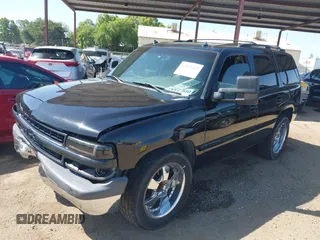 2003 Chevrolet Tahoe LS z VIN 1GNEC13T53J331221, wystawiony jako IAAI lot #42422243 z przebiegiem Nie podano mil oraz . Historia ofert i sprzedaży dostępna na DreamBid. Obrazek 18.