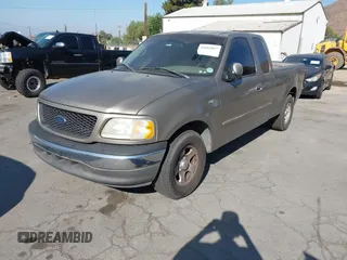 2002 Ford F-150 XL with VIN 1FTRX17WX2NA97846, listed as a IAAI auction lot 42682857 with 185,438 mi miles and . Bid and sale history available at DreamBid. Image 2.