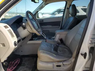 2010 Ford Escape Hybrid with VIN 1FMCU4K3XAKB42955, listed as a Copart auction lot 57533165 with 389,929 mi miles and Clean title. Bid and sale history available at DreamBid. Image 7.