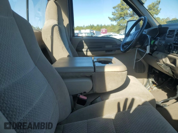 2002 Ford F-250 XL with VIN 1FTNF21L02EA83007, listed as a Copart auction lot 87880345 with 104,889 mi miles and Salvage title. Bid and sale history available at DreamBid. Image 10.