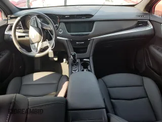 2023 Cadillac XT5 FWD Luxury z VIN 1GYKNAR4XPZ144533, wystawiony jako Copart lot #74734164 z przebiegiem Nie podano mil oraz Nie do naprawy • Non repairable. Historia ofert i sprzedaży dostępna na DreamBid. Obrazek 8.
