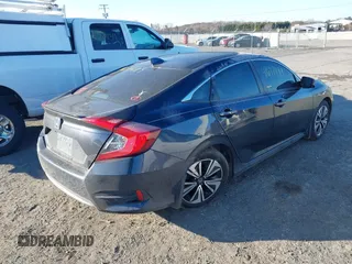 2017 Honda Civic Sedan EX-L with VIN 19XFC1F75HE022400, listed as a IAAI auction lot 41677489 with 157,237 mi miles. Bid and sale history available at carsss.com. Image 4.
