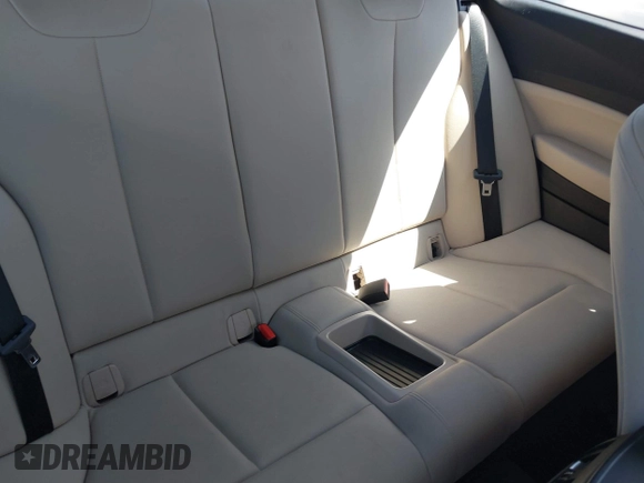 2016 BMW 2 Series 228i with VIN WBA1F9C5XGV545664, listed as a IAAI auction lot 39327505 with 94,583 mi miles. Bid and sale history available at carsss.com. Image 8.