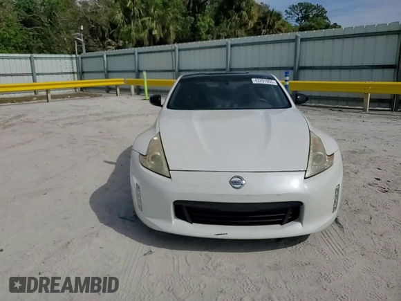 2016 Nissan 370Z z VIN JN1AZ4EH3GM931338, wystawiony jako Copart lot #43291955 z przebiegiem 69 843 mil mil oraz Szkoda całkowita • Salvage title. Historia ofert i sprzedaży dostępna na DreamBid. Obrazek 11.
