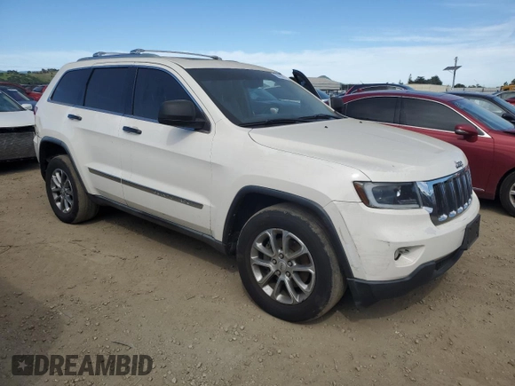 2012 Jeep Grand Cherokee Laredo with VIN 1C4RJEAG0CC222943, listed as a Copart auction lot 52899545 with 153,389 mi miles and Salvage Title. Bid and sale history available at carsss.com. Image 4.