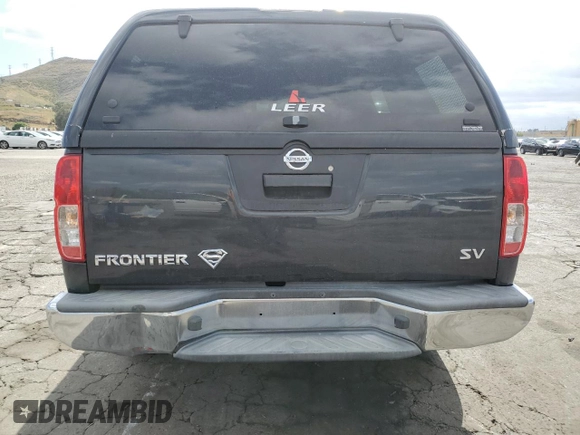 2015 Nissan Frontier SV with VIN 1N6BD0CTXFN708820, listed as a Copart auction lot 56605085 with 119,299 mi miles and Salvage title. Bid and sale history available at DreamBid. Image 6.