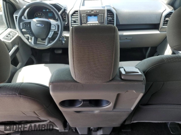2018 Ford F-150 XL with VIN 1FTEW1E53JKC57304, listed as a Copart auction lot 57168915 with 118,498 mi miles and Salvage title. Bid and sale history available at DreamBid. Image 8.