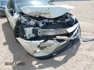 2022 Toyota Camry TRD with VIN 4T1KZ1AK6NU069341, listed as a IAAI auction lot 41881252 with 55,871 mi miles and . Bid and sale history available at DreamBid. Image 6.