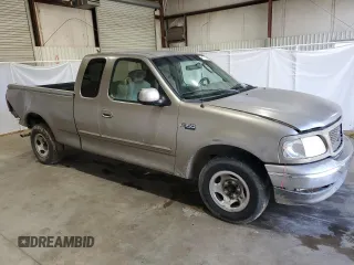 2003 Ford F-150 XL with VIN 1FTRX17283NA46215, listed as a Copart auction lot 85194094 with 168,415 mi miles and Salvage title. Bid and sale history available at DreamBid. Image 4.