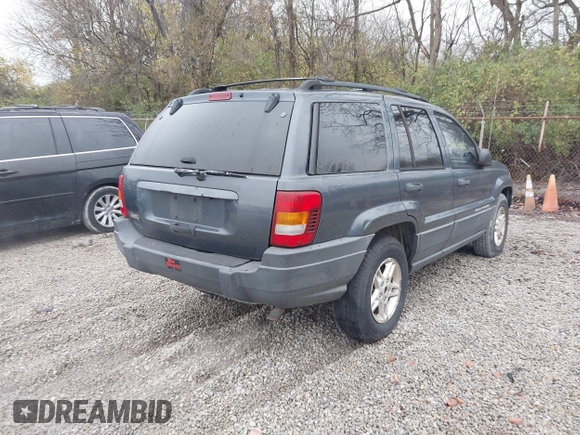 2003 Jeep Grand Cherokee Laredo with VIN 1J4GX48SX3C604904, listed as a IAAI auction lot 40884443 with 188,352 mi miles. Bid and sale history available at carsss.com. Image 4.